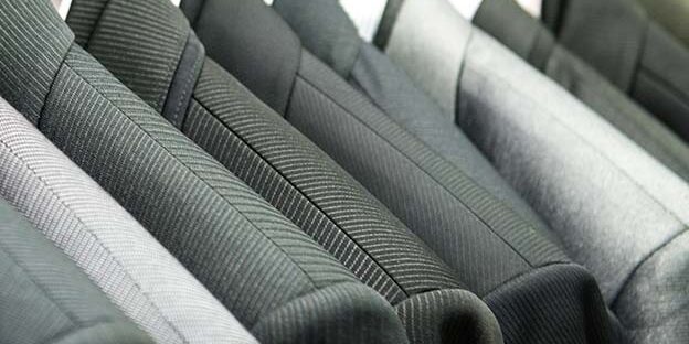 lavandería en Valencia – traje de chaqueta chico y chica